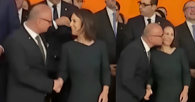 Croatia's Gordan Radman tries to kiss German Foreign Minister Annalena at  EU conference