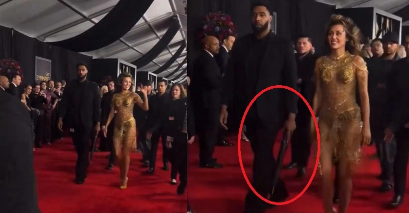 Umbrella or Secret Firearm? Miley Cyrus' bodyguard at Grammy 2024 Red Carpet fuels conspiracy theories