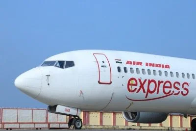 Air India Express, Delhi to Jammu flight, flight IX-2564, technical issue, flight returns mid-air, alternative aircraft arranged, flight disruption, Delhi airport, Jammu airport, Air India Express spokesperson, Air India Express controversy, Patna Airport incident, missing baggage, flight IX2936, Bengaluru to Patna flight, baggage not loaded, weight limitation, passenger protest, CISF intervention, airline apology, passenger inconvenience, domestic flight issues, luggage delivery assurance- True Scoop